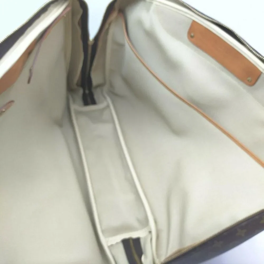 Louis Vuitton Monogram Alize 1 Poche Travel Bag